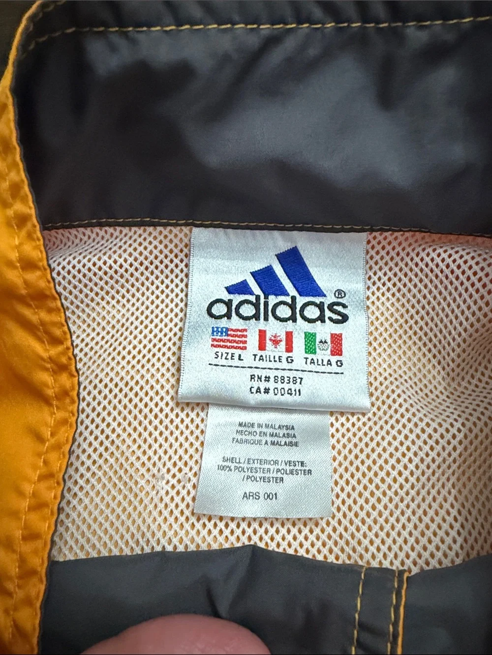 Vintage 90’s Adidas yellow windbreaker